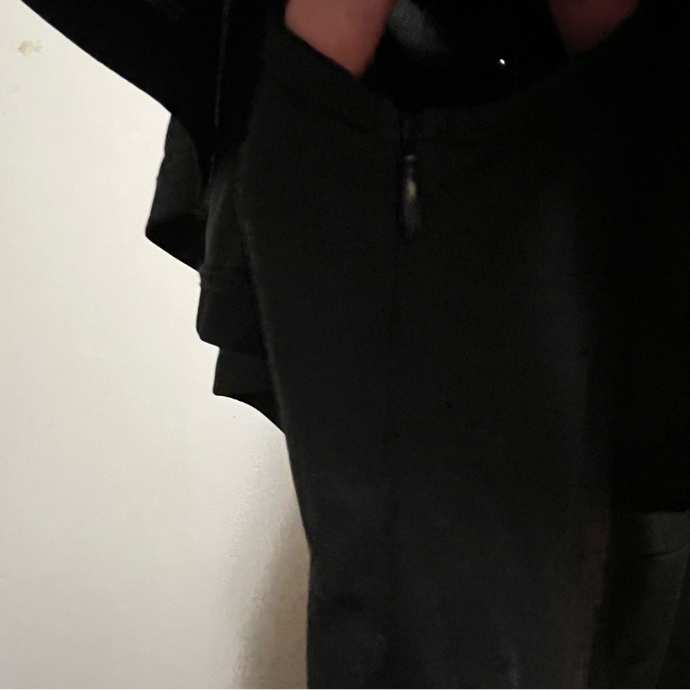 Chic Black Off-Shoulder Jumpsuit with Ruffle Detail - Picture 7 of 10